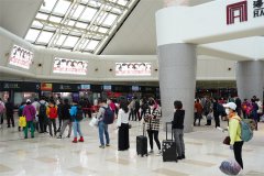 商品編碼查詢-氣溫攀升 客流回暖 海口美蘭國際機(jī)場戰(zhàn)“疫”復(fù)工兩手抓（附圖